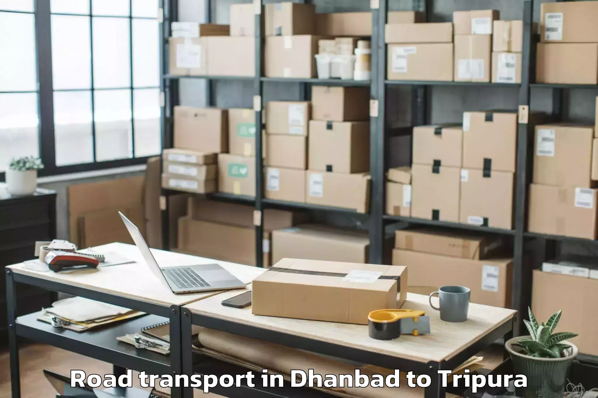 Book Dhanbad to Melaghar Road Transport Online